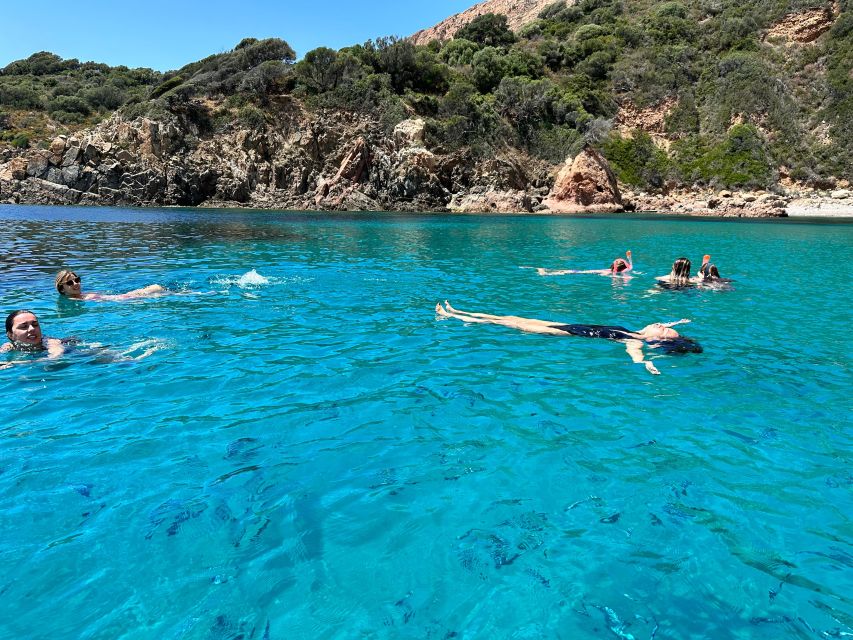 Ajaccio: Scandola - Girolata - Piana - Capo Rosso Tour - Capo Rosso natural pools: the last swim with a pink cape backdrop
