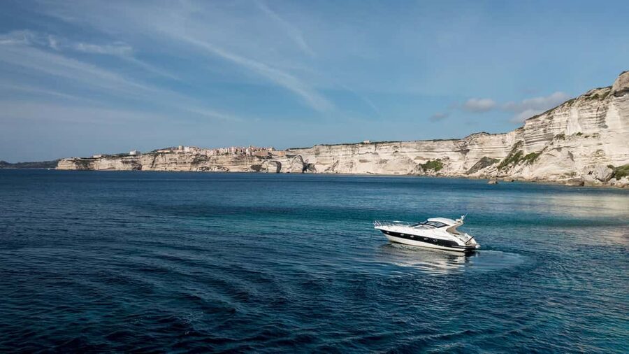 Bonifacio: Sunset Aperitif Dining Boat Tour - Old Town, cliffs, and caves: how the sightseeing fits the meal