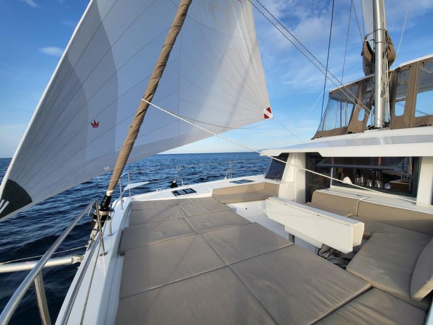 Bonifacio: sunset catamaran trip and aperitif - Comfort on a catamaran: sun loungers make a difference