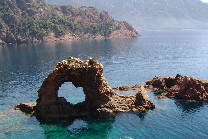 Calanches de Piana and Scandola Reserve cruise with swimming stop - What the onboard experience feels like: captain commentary and humor
