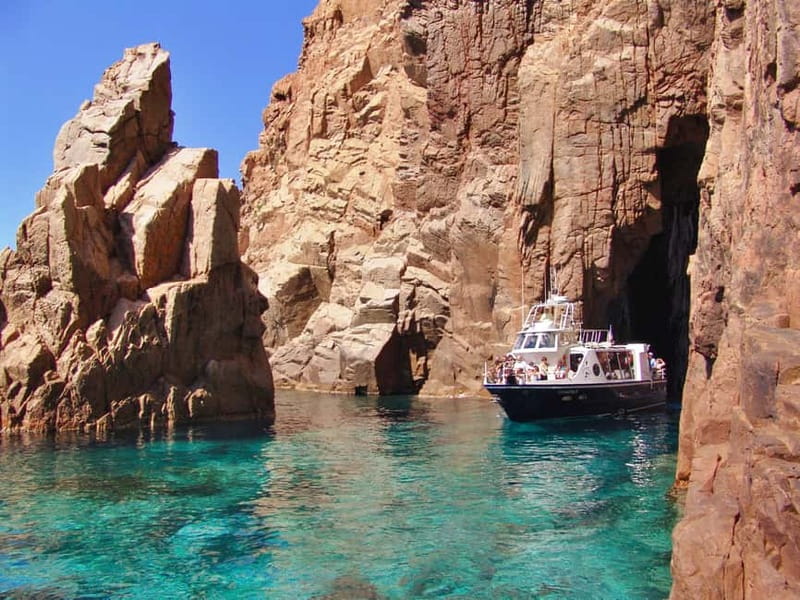 Cargèse: Calanques of Piana on a family boat - Plage d’Arone and the Arch of Capo Rosso: Red Granite in Motion