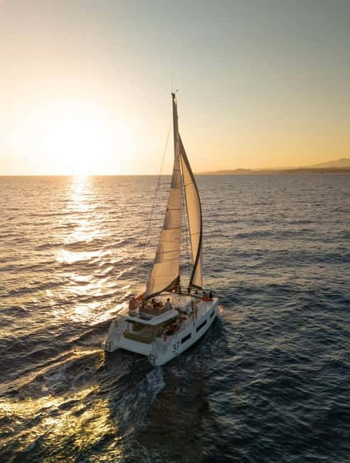 Catamaran trip to the Lavezzi Islands at sunset with snorkeling - Boarding in Piantarella or Bonifacio, and learning the basics of sailing