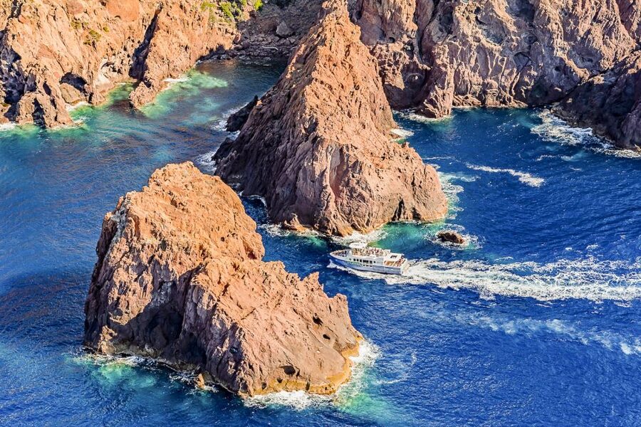 From Ota: Scandola Nature Reserve Eco-Friendly Boat Tour - Caves, bays, and the “protected pass-by” style of cruising